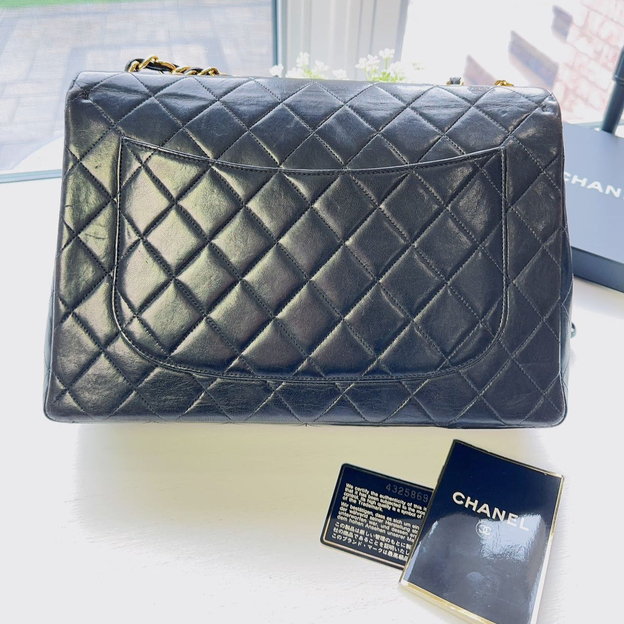 Chanel-Timeless-Jumbo-single-shoulder-flap-bag-black-quilted-lambskin-Back
