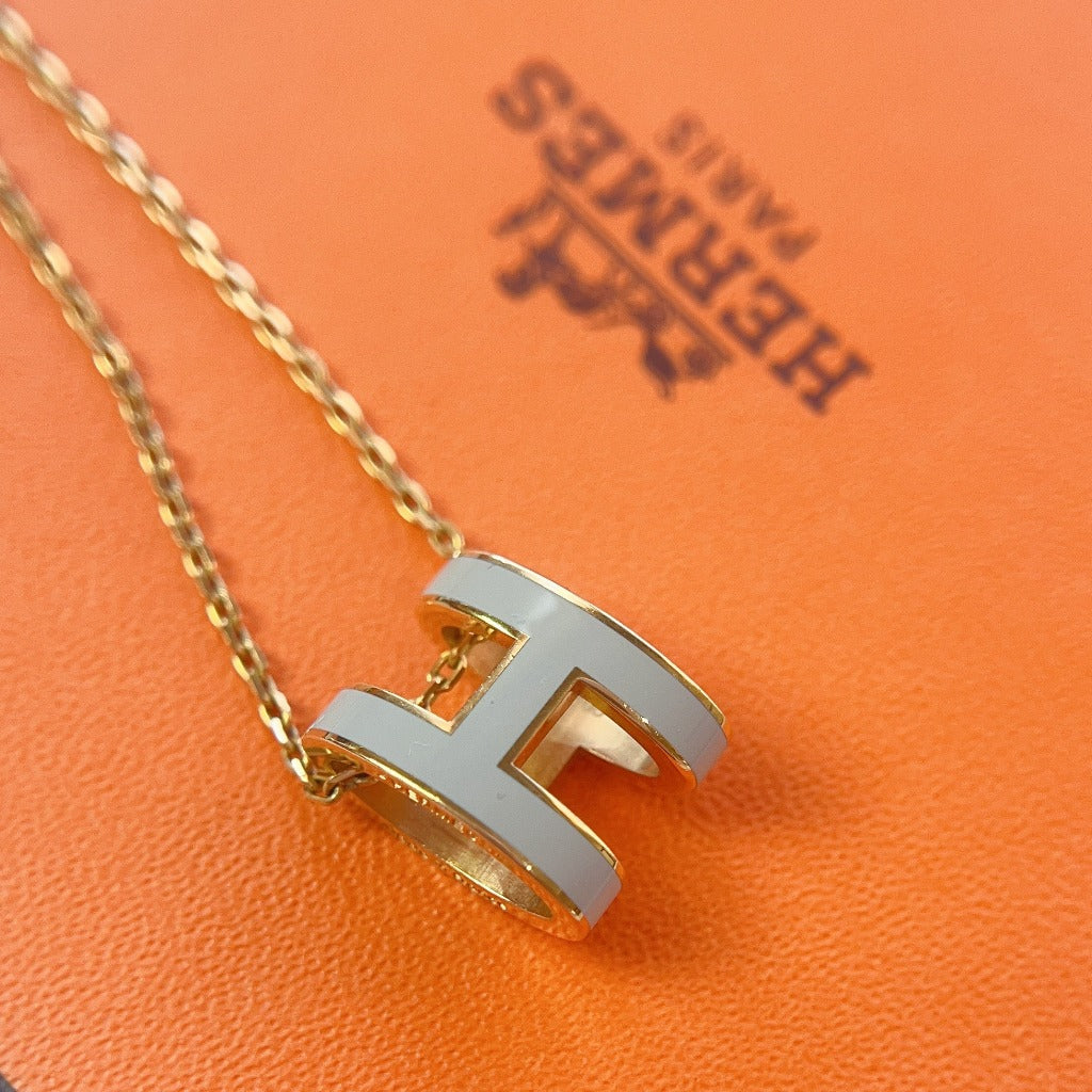 Hermes Gold Pop H Pendant Necklace white