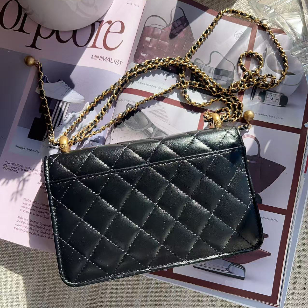 Chanel Black quilted handbag with gold chain