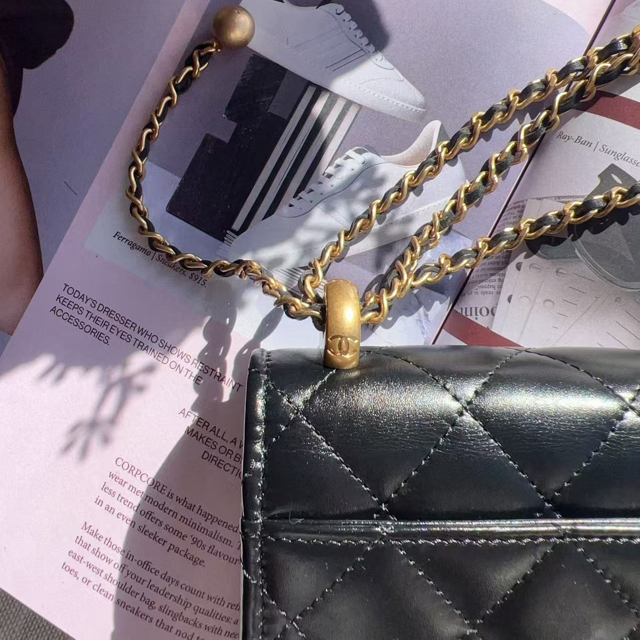 Chanel Black quilted handbag with gold chain