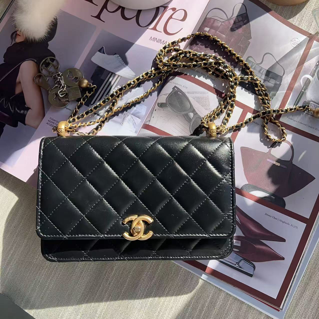 Chanel Black quilted handbag with gold chain