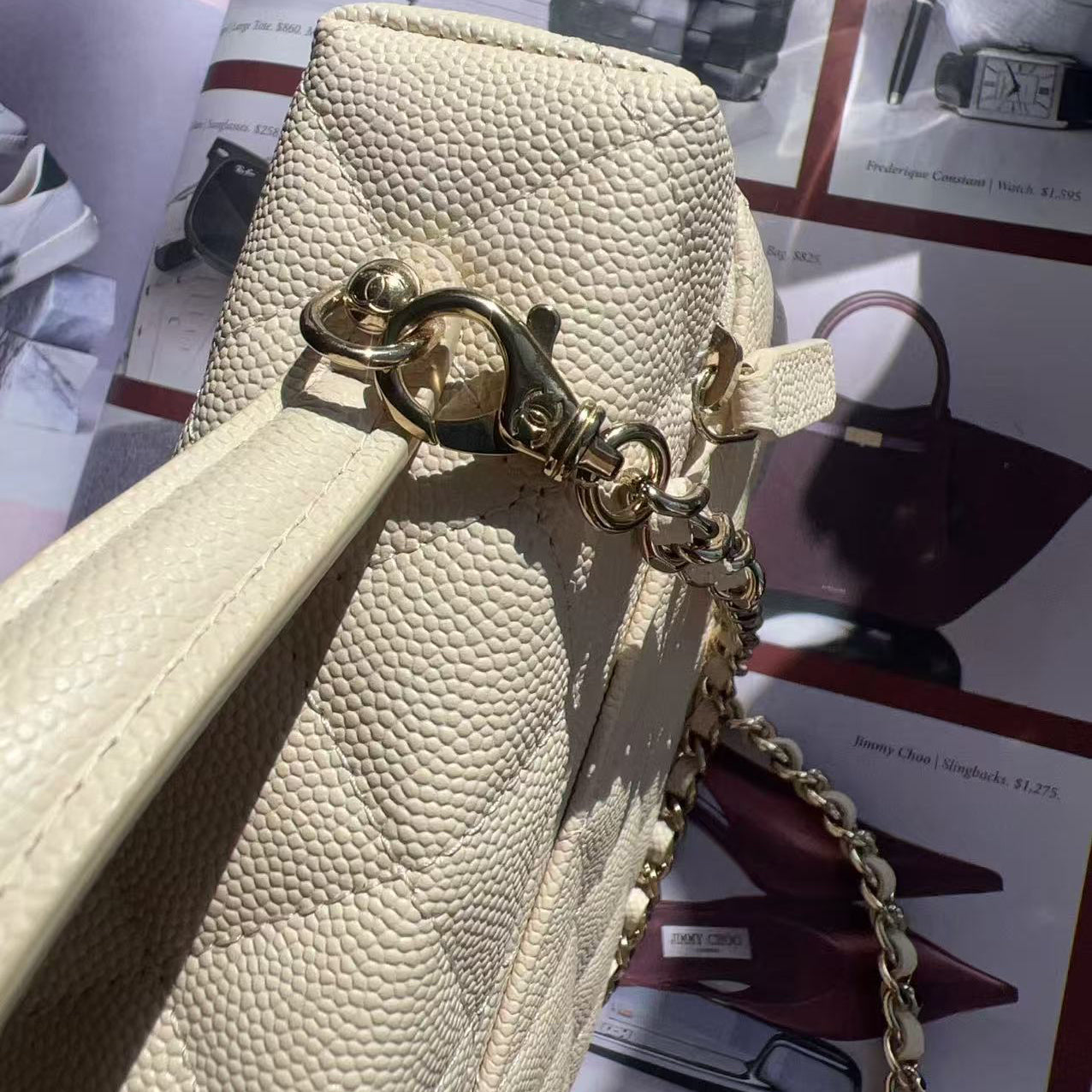 Beige handbag with gold chain strap