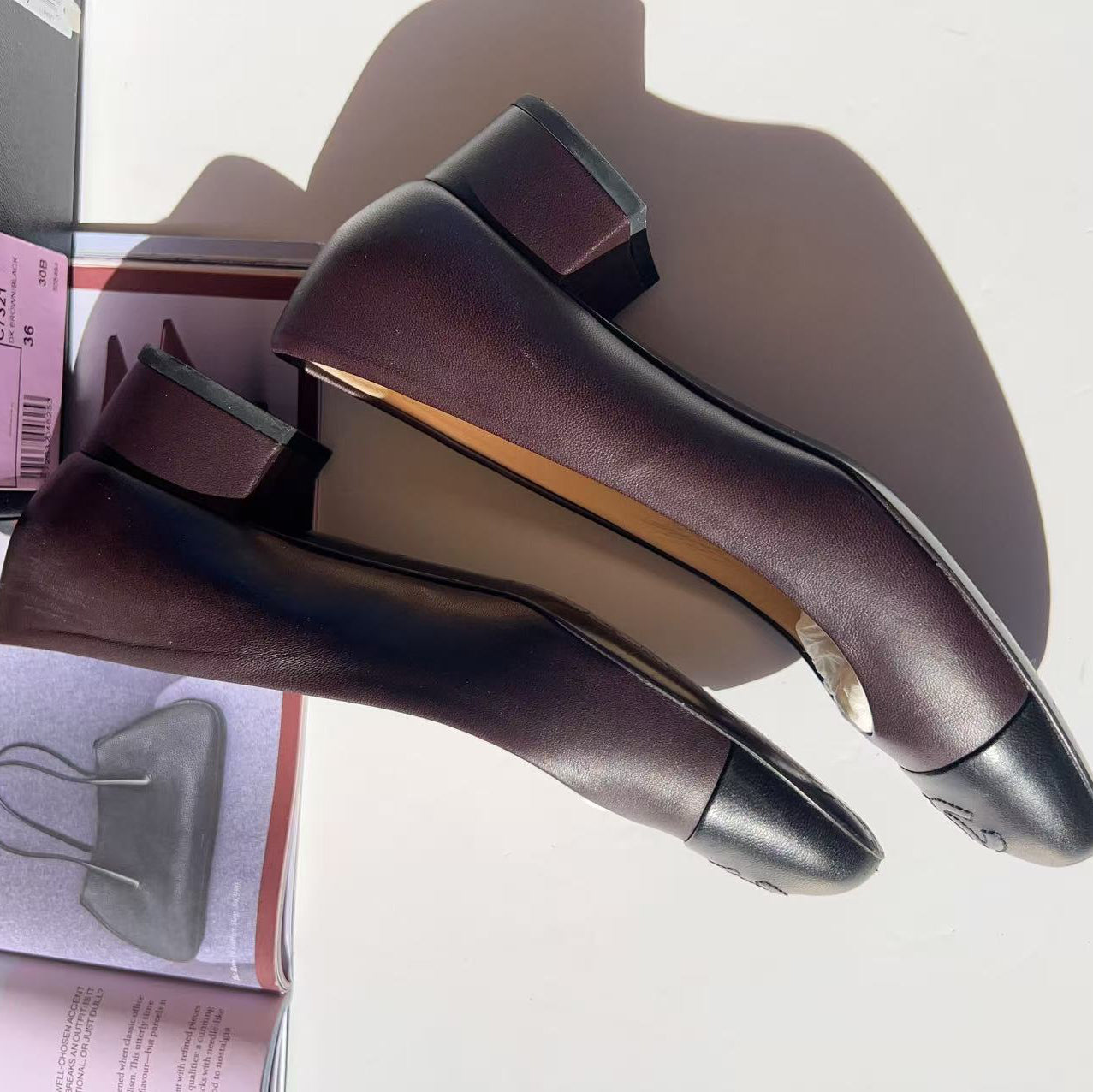Pair of brown leather shoes on a white background
