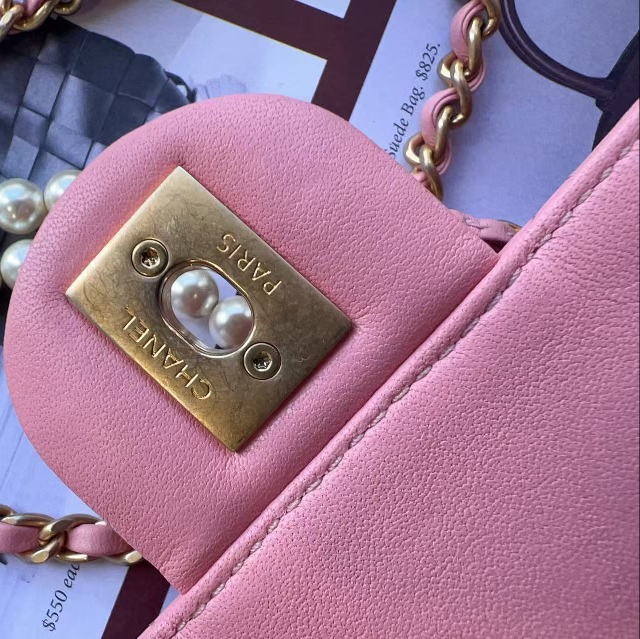 Chanel Pink handbag with gold chain and pearl detail