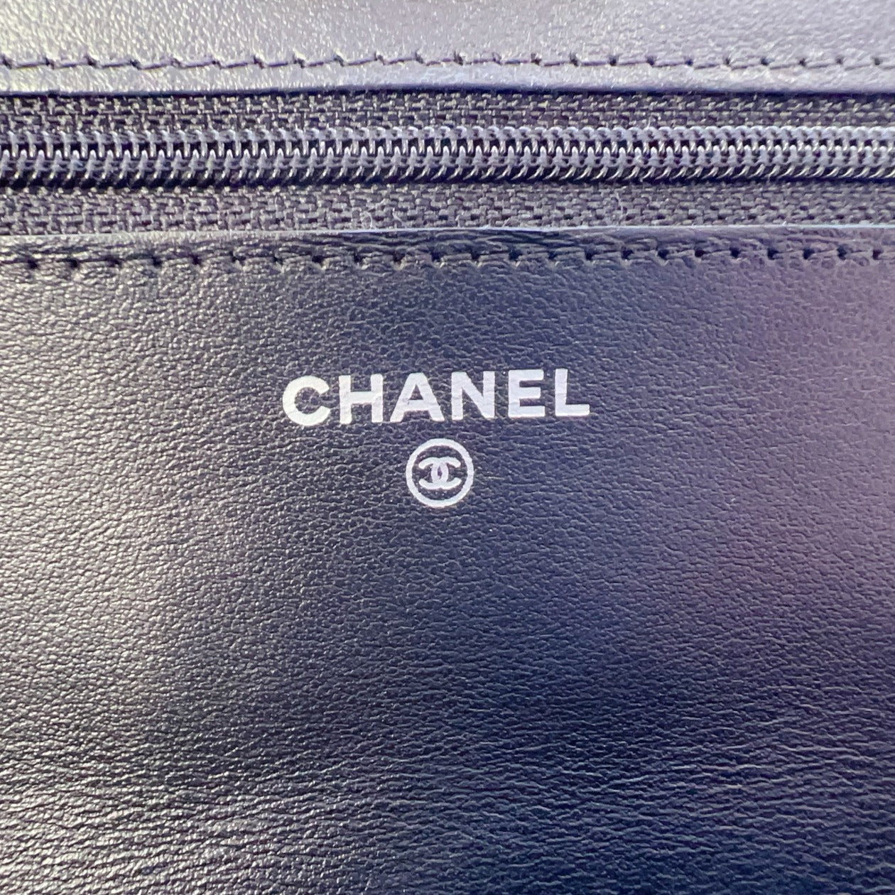 Chanel-Aged-Calfskin-Quilted-Reissue-WOC-So-Black-logo