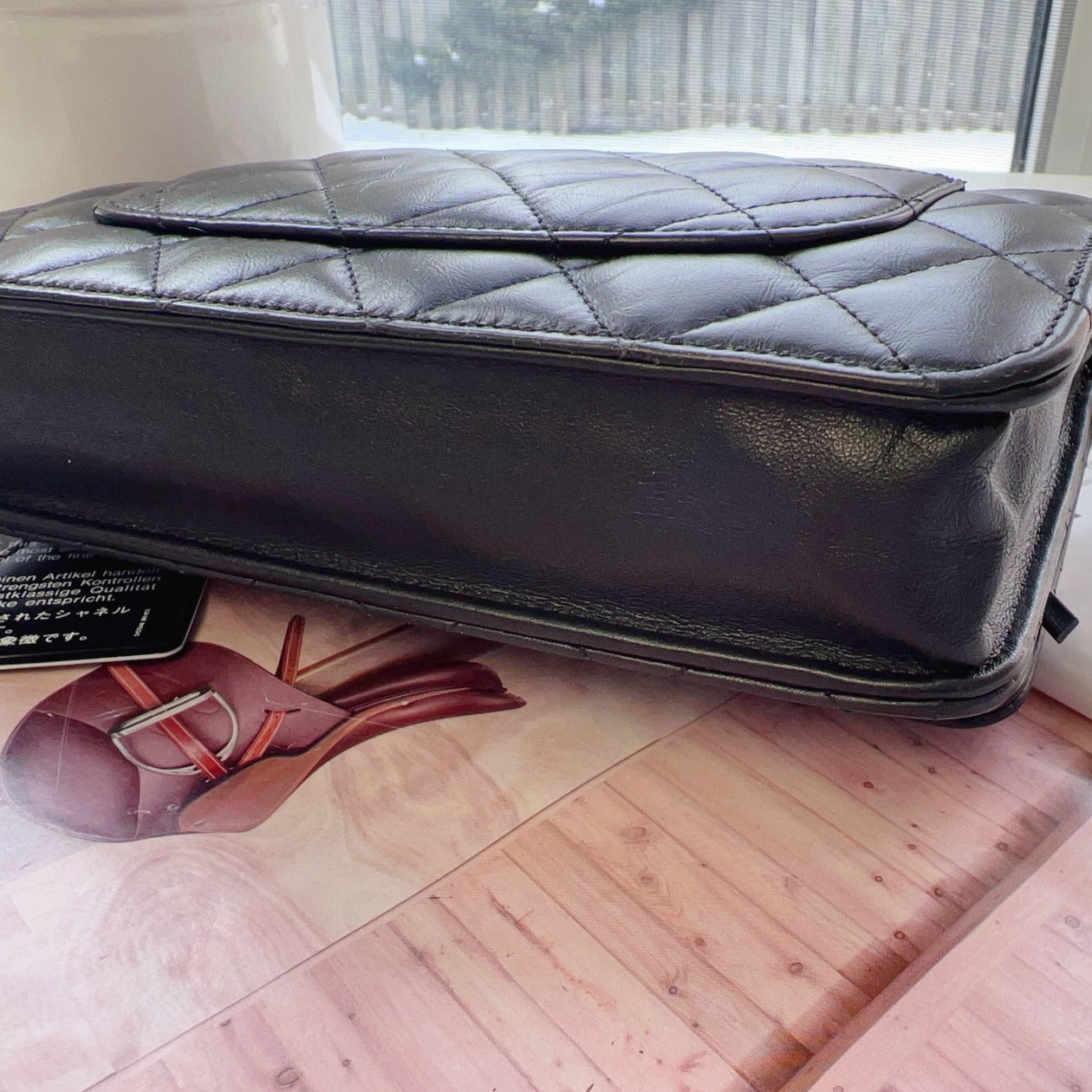 Chanel-Aged-Calfskin-Quilted-Reissue-WOC-So-Black-coners