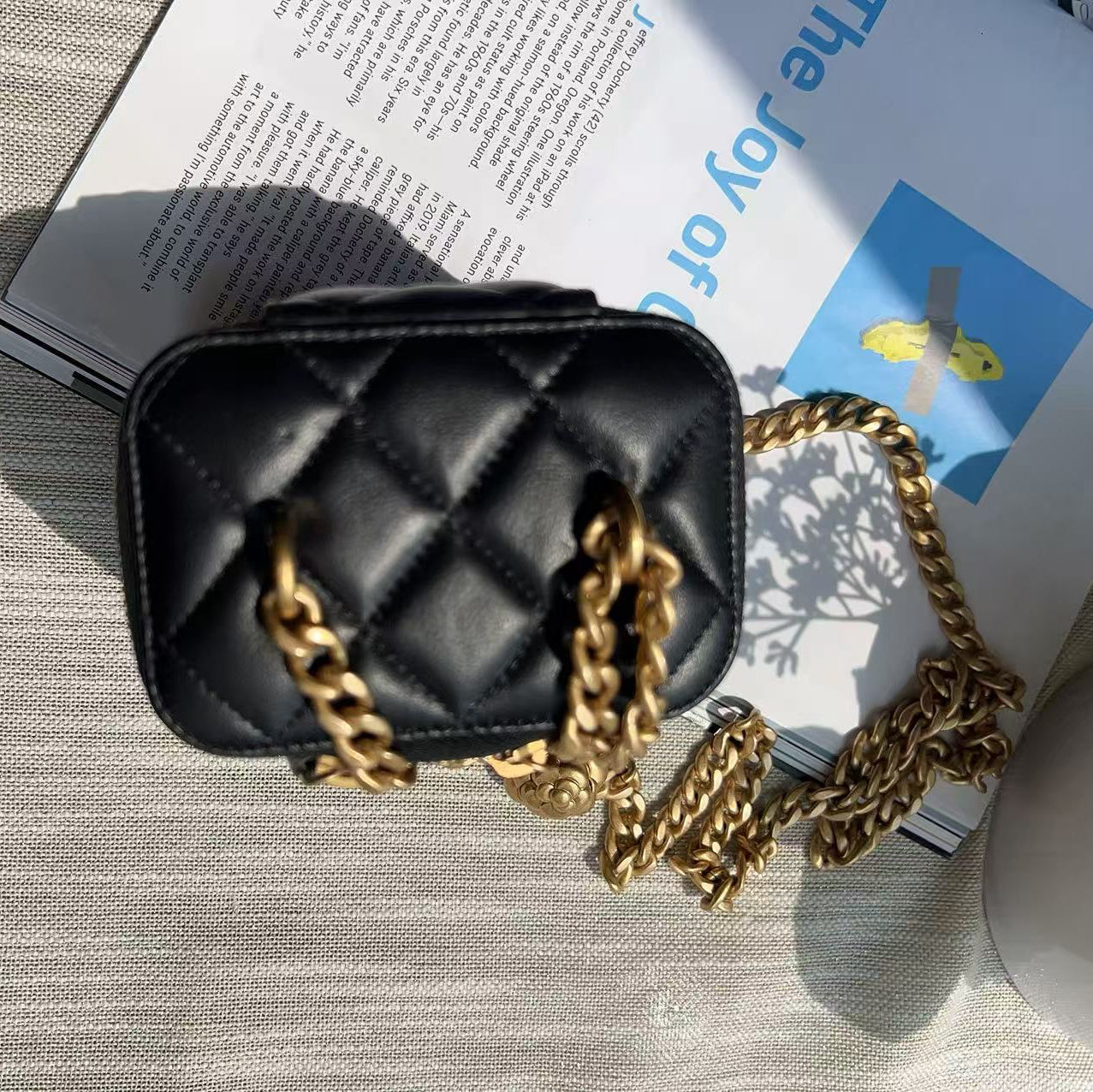 Chanel Vanity Case with Camellia Chain Black