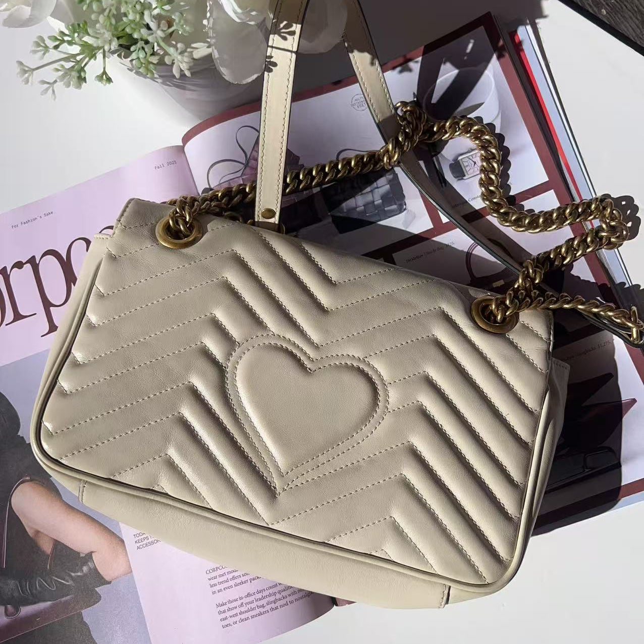 Beige handbag with heart design