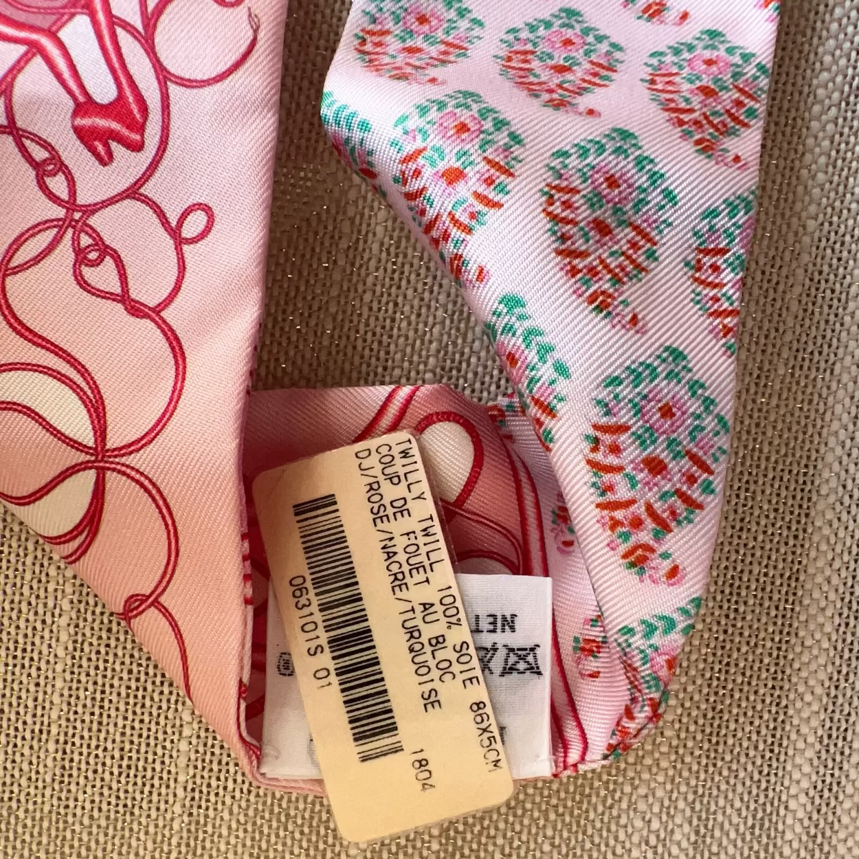 Fabric with a patterned label on a textured surface