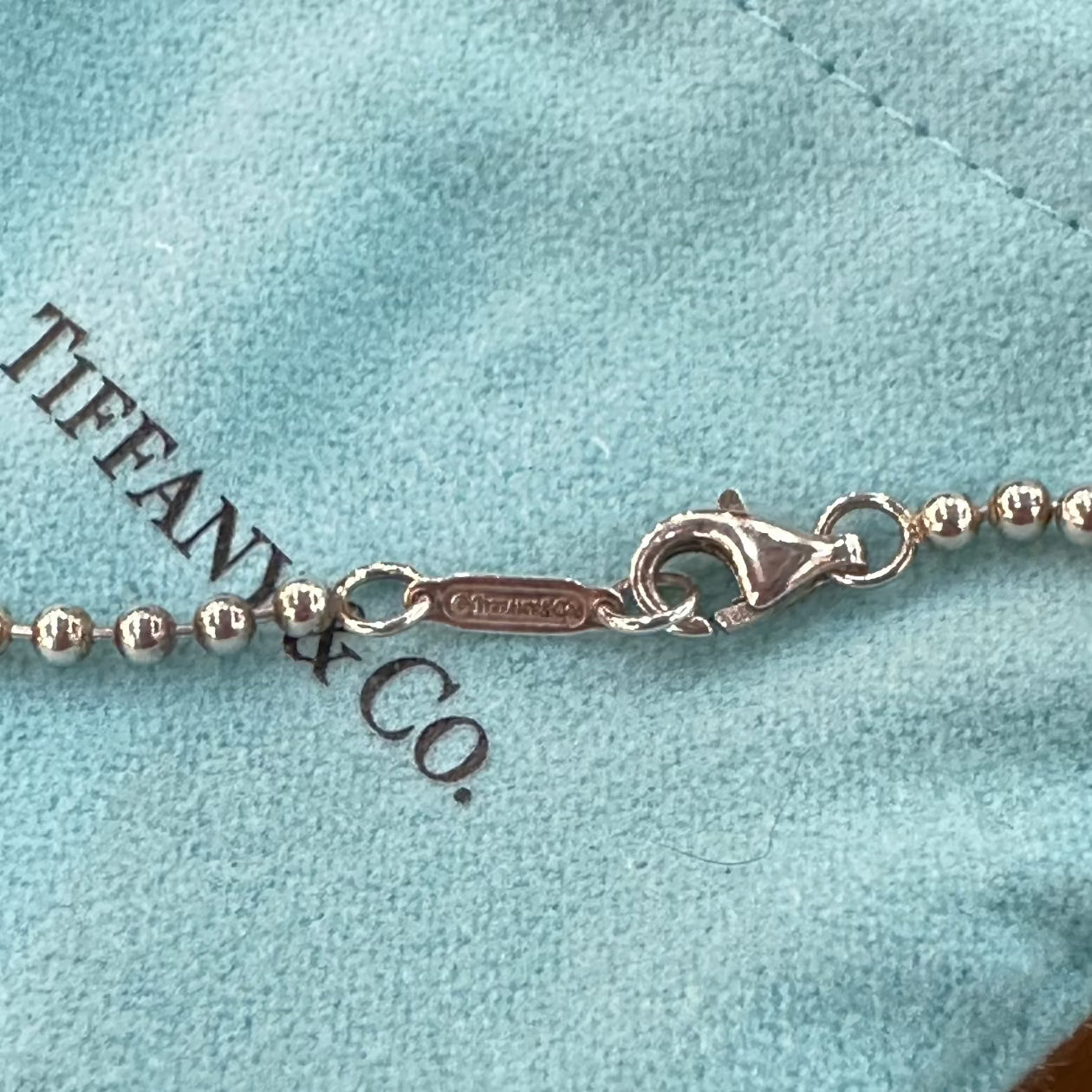 Tiffany & Co 925 Silver Atlas Tag Pendant Necklace.