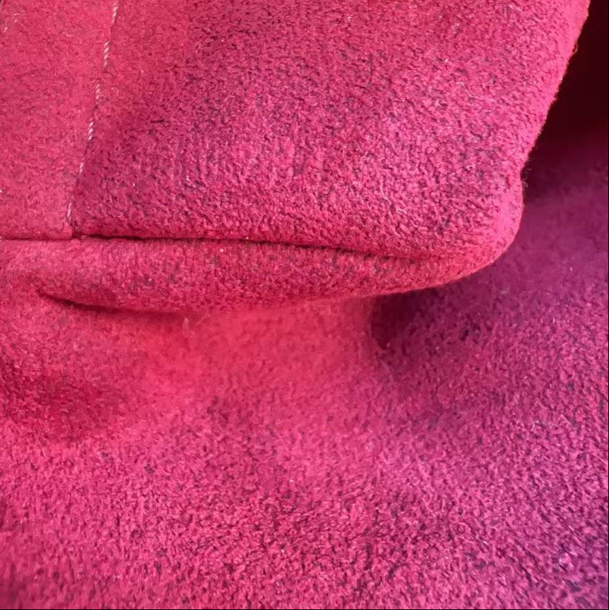 Close-up of a textured red fabric surface