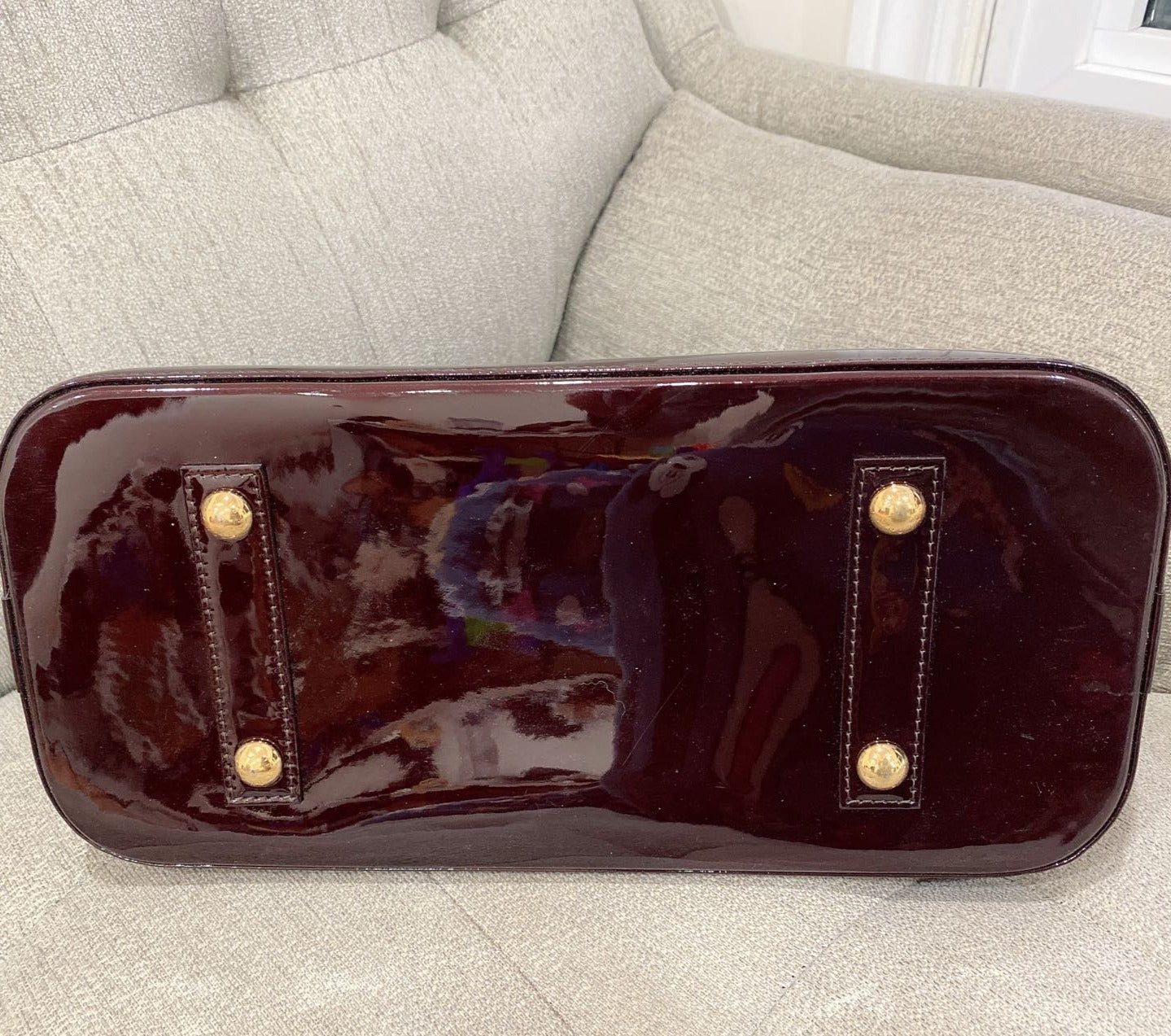 Louis Vuitton Monogram Vernis Amarante Alma MM bottom