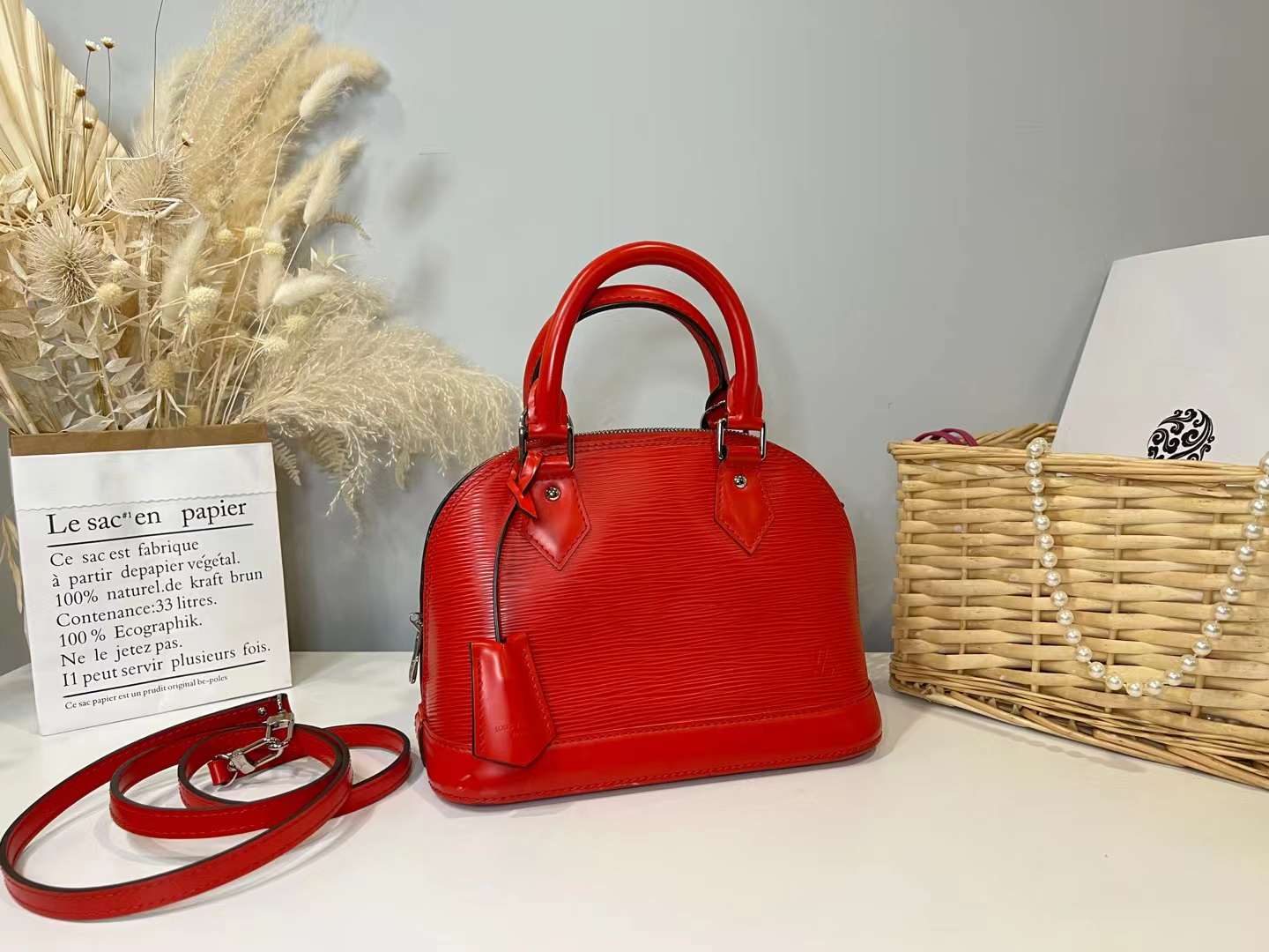 Louis Vuitton Alma small model handbag in red epi leather