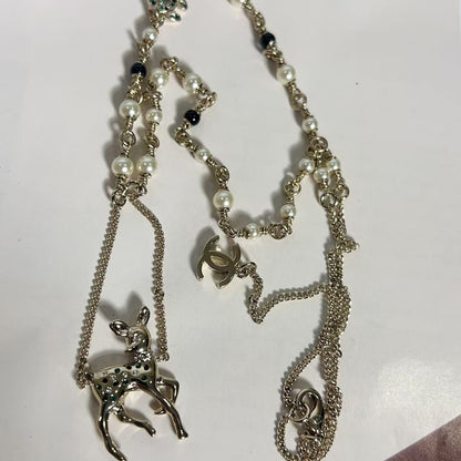 Necklace with a dog pendant on a white background