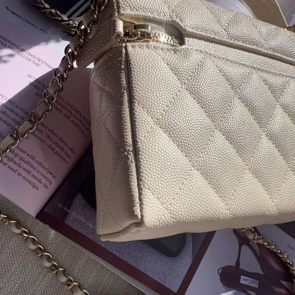 Beige handbag with gold chain strap