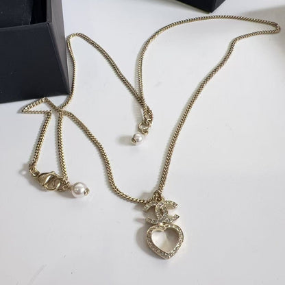 Chanel CC  Crystal Pearl and Gold Metal CC Heart Necklace