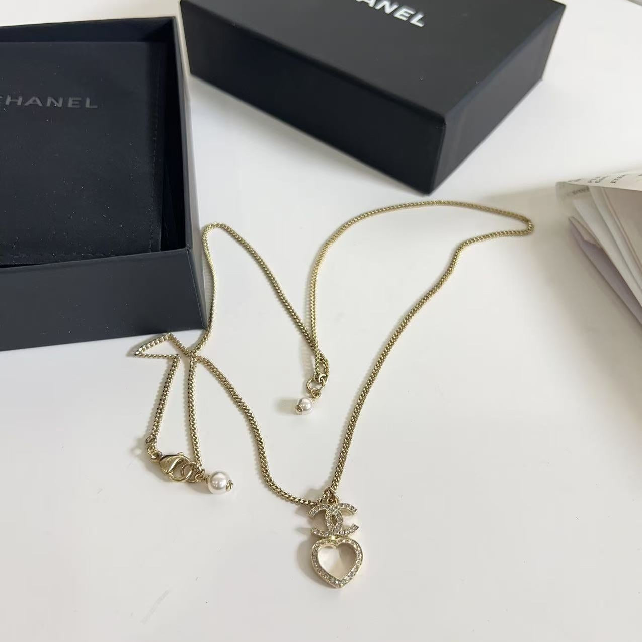 Chanel CC  Crystal Pearl and Gold Metal CC Heart Necklace