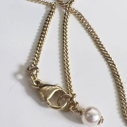 Chanel CC  Crystal Pearl and Gold Metal CC Heart Necklace