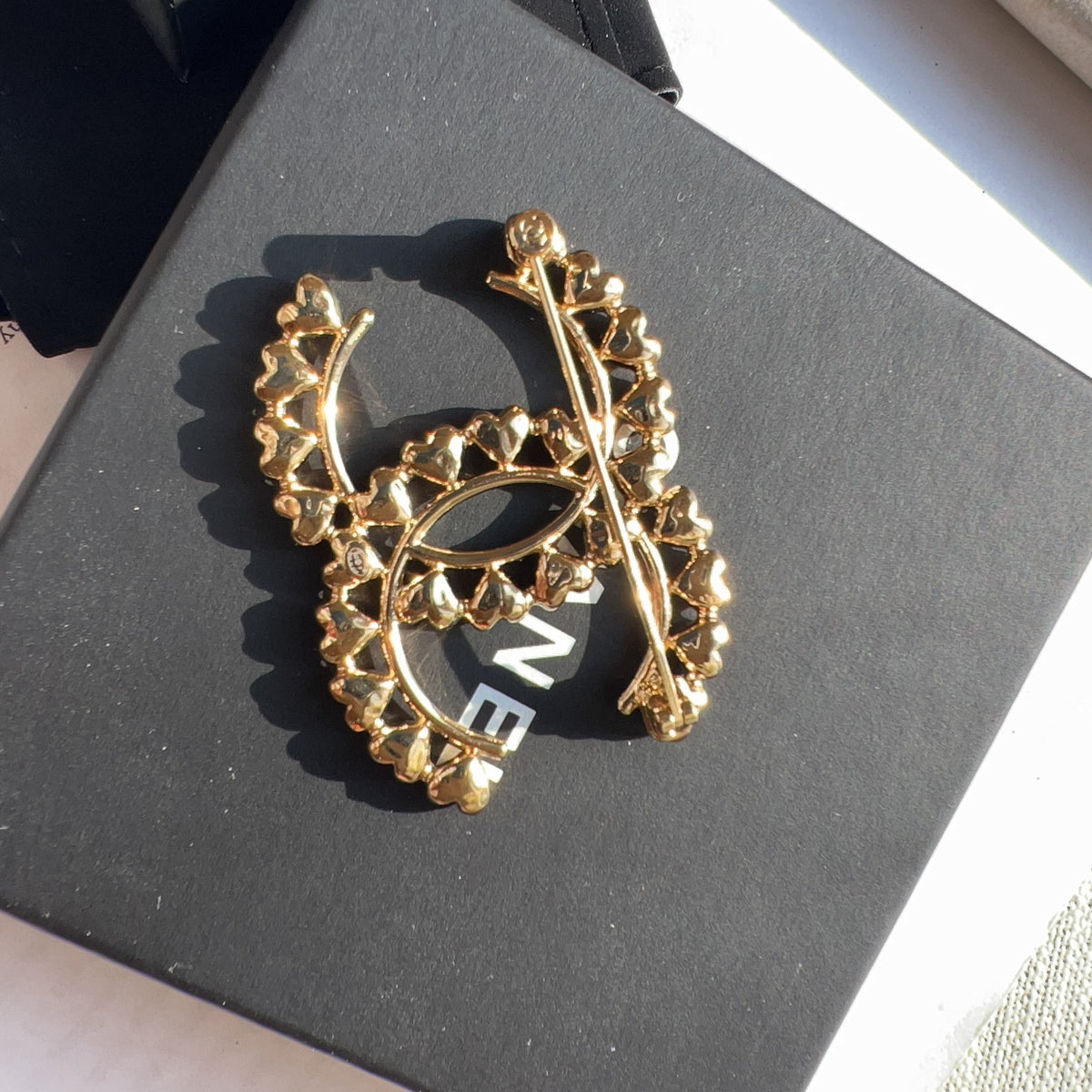 Chanel Gold Metal CC with Mini Hearts Brooch 2023