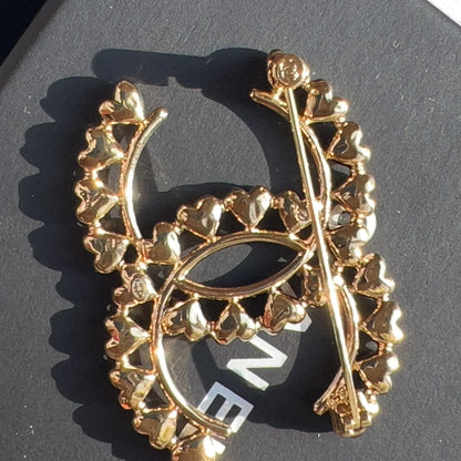 Chanel Gold Metal CC with Mini Hearts Brooch 2023
