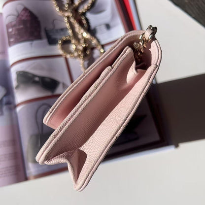 Pink wallet with gold clasp