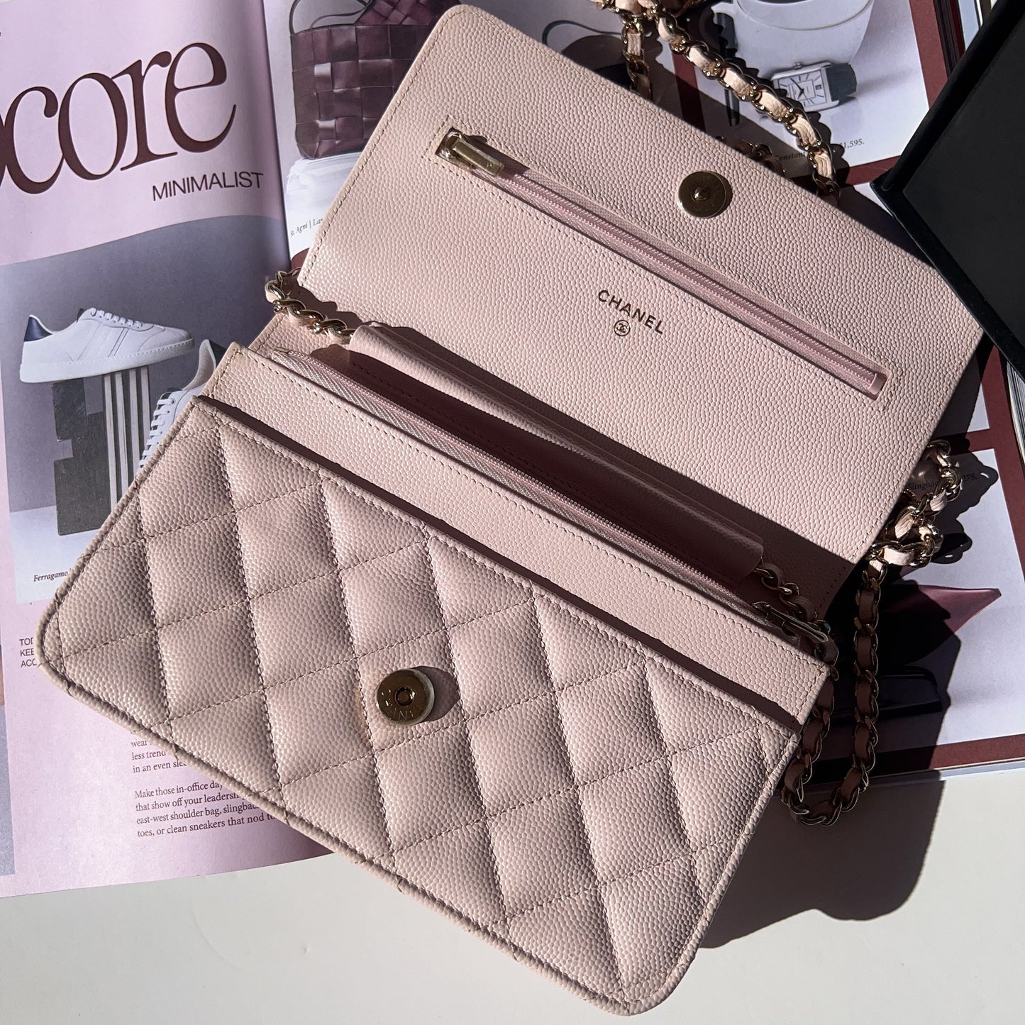 Chanel quilted handbag on a magazine 