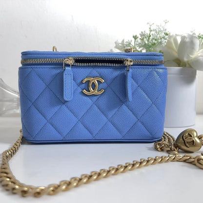 Chanel Vanity with Heart Chain Blue Caviar Aged Gold New