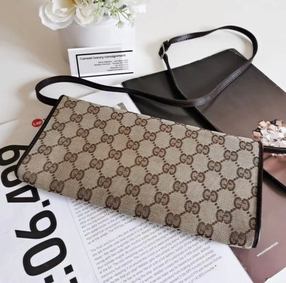 Gucci GG Canvas Bamboo Bar Clutch