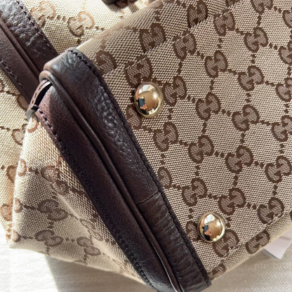 Close-up of a patterned handbag with a focus on the texture and design.