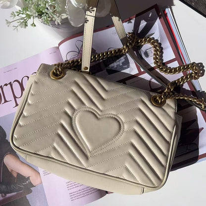 Beige handbag with heart design 
