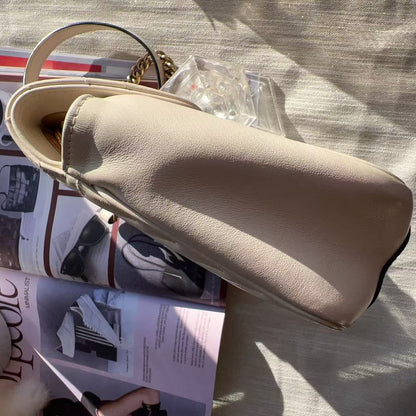 Beige loafer on a magazine 