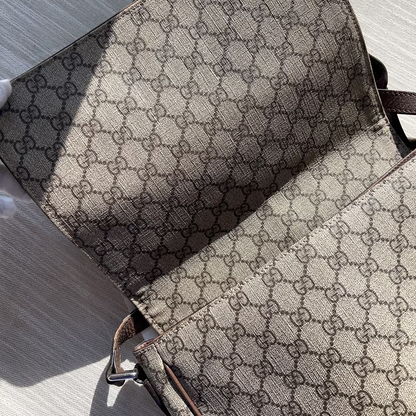 Two patterned bags on a textured surface