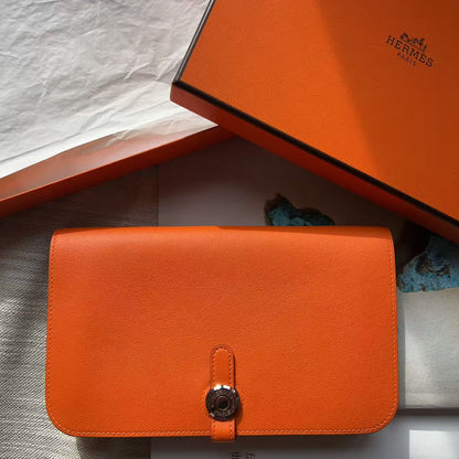 HERMÈS Orange CLEMENCE LEATHER DOGON WALLET