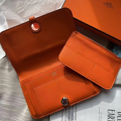 HERMÈS Orange CLEMENCE LEATHER DOGON WALLET