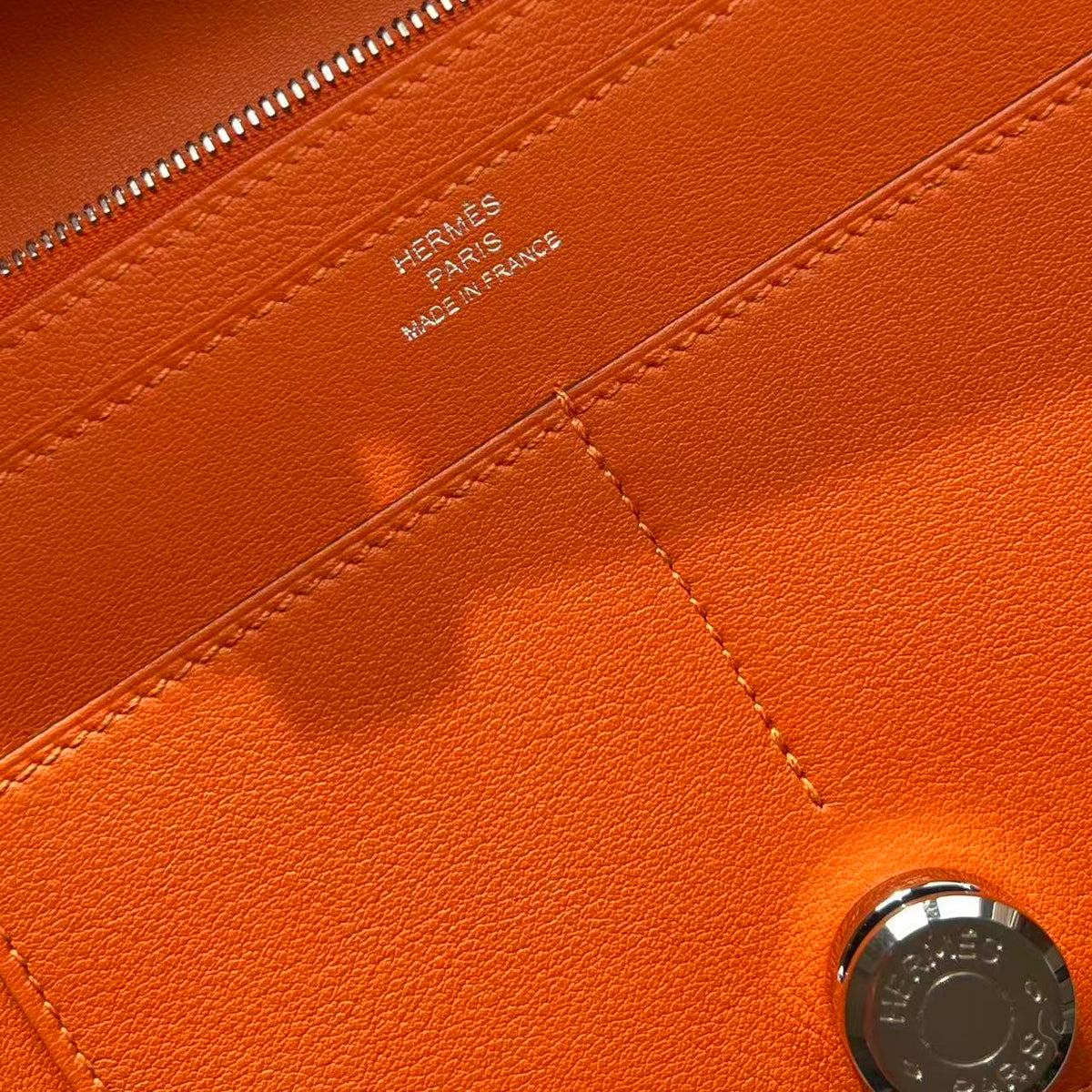 HERMÈS Orange CLEMENCE LEATHER DOGON WALLET