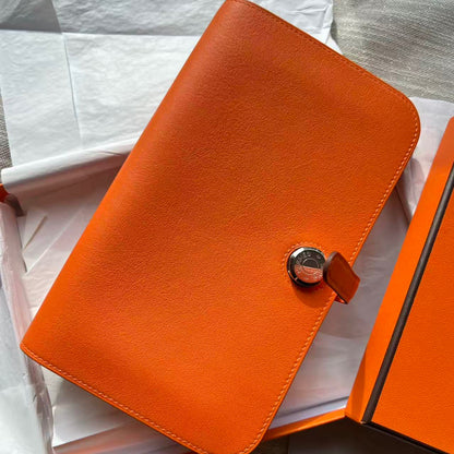 HERMÈS Orange CLEMENCE LEATHER DOGON WALLET