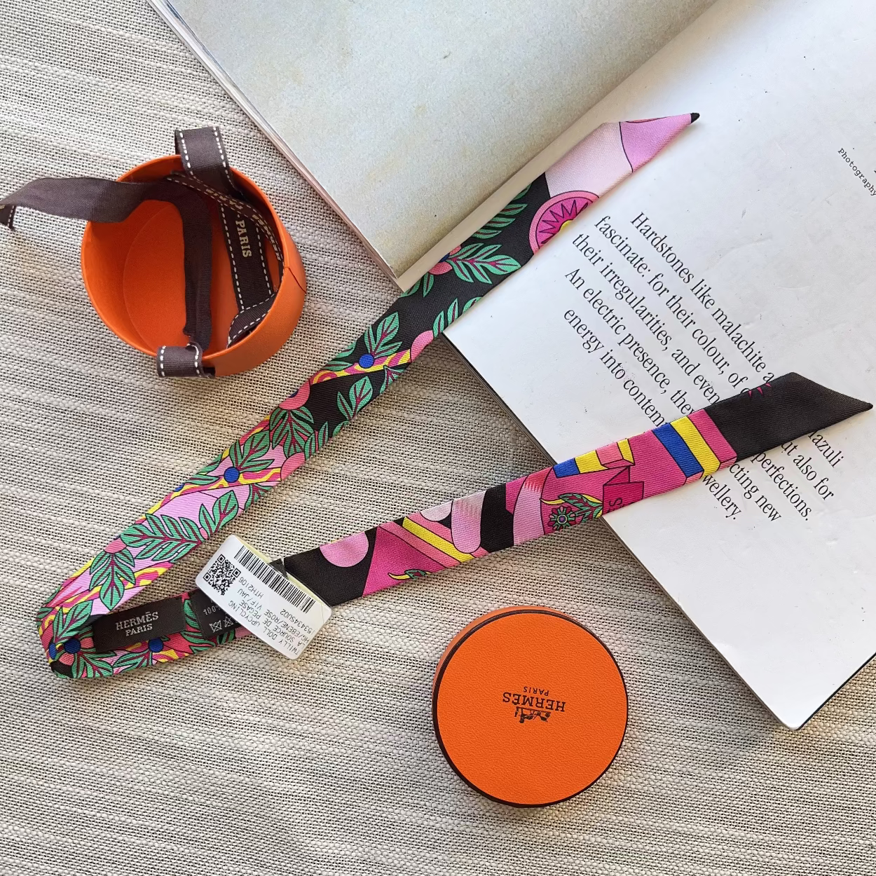 Colorful lanyard with a brand tag on a textured surface