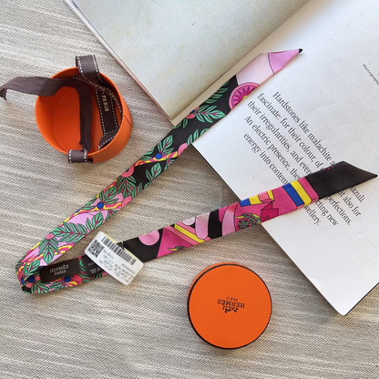Colorful lanyard with a brand tag on a textured surface