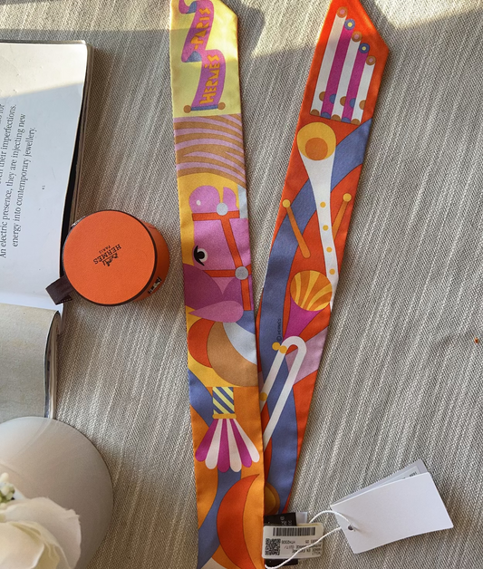 Colorful belt with abstract designs on a textured surface