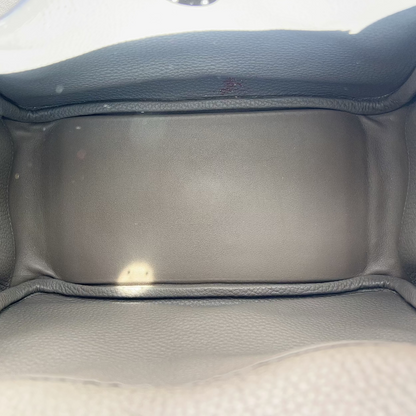 Gray car interior with a focus on the back seat area.