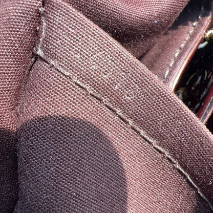 Close-up of a brown fabric with stitching details