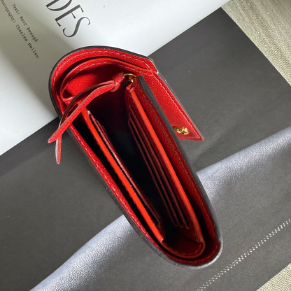 Red wallet open on a surface with 'ZIP CODES' text in the background