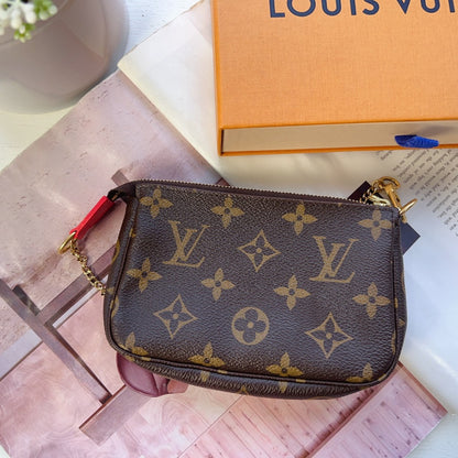 Louis Vuitton Christmas Animation Monogram Mini Pochette