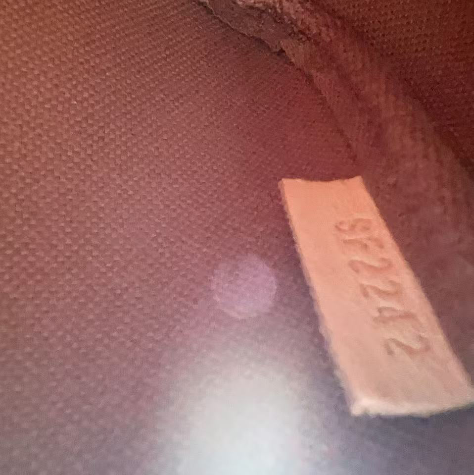 Fabric with a label showing 'SF2242' on a brown background
