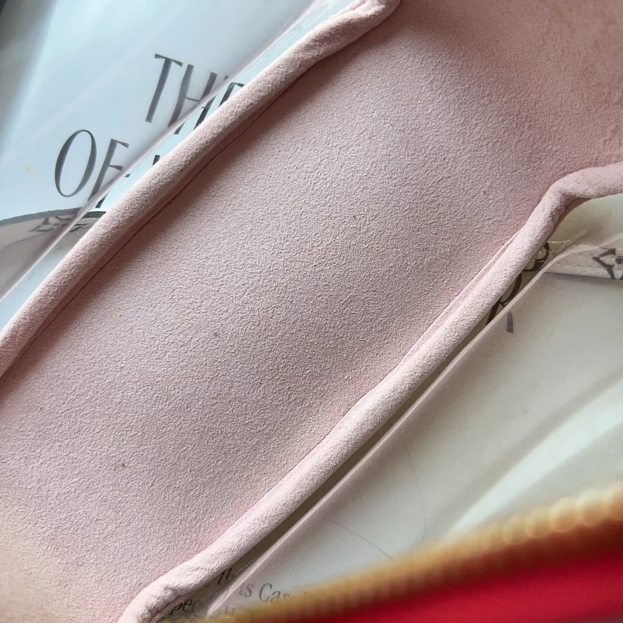 Close-up of a pink fabric surface with a blurred background