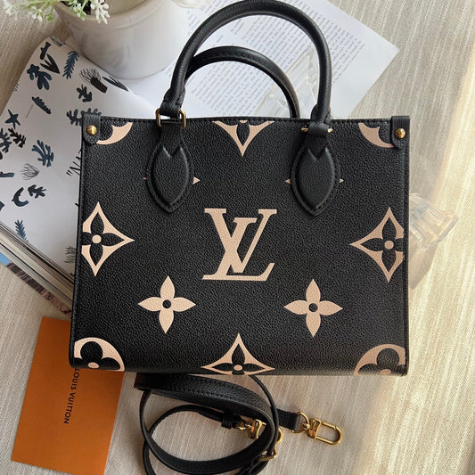 Louis Vuitton handbag with monogram pattern on a light wooden surface