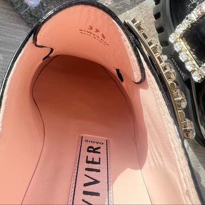 Close-up of a shoe with a visible brand logo on the insole.
