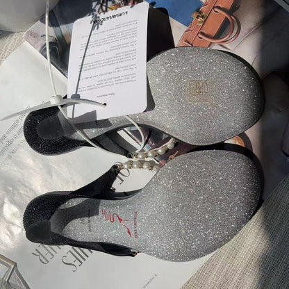 A pair of black slingback high-heeled shoes with silver glitter soles, displayed on top of printed papers with a white retail tag attached.