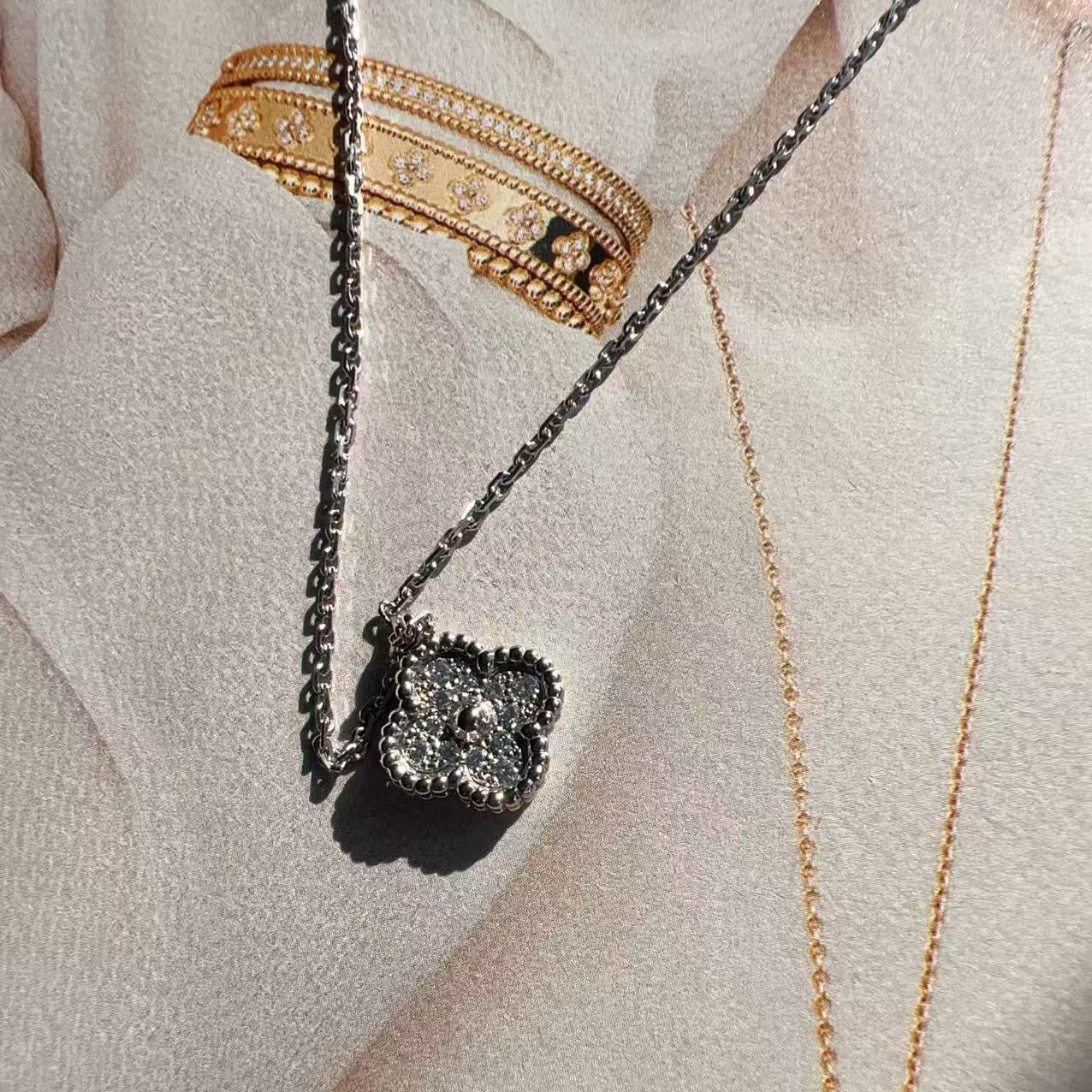 Two necklaces with intricate designs 