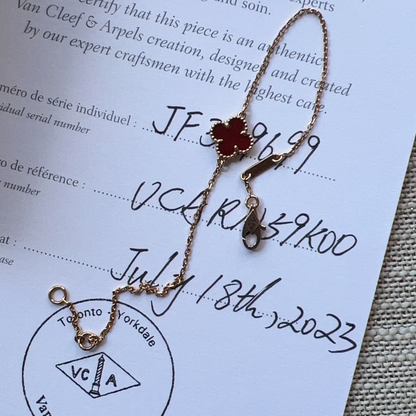 Van Cleef & Arpels necklace with certification on a branded paper